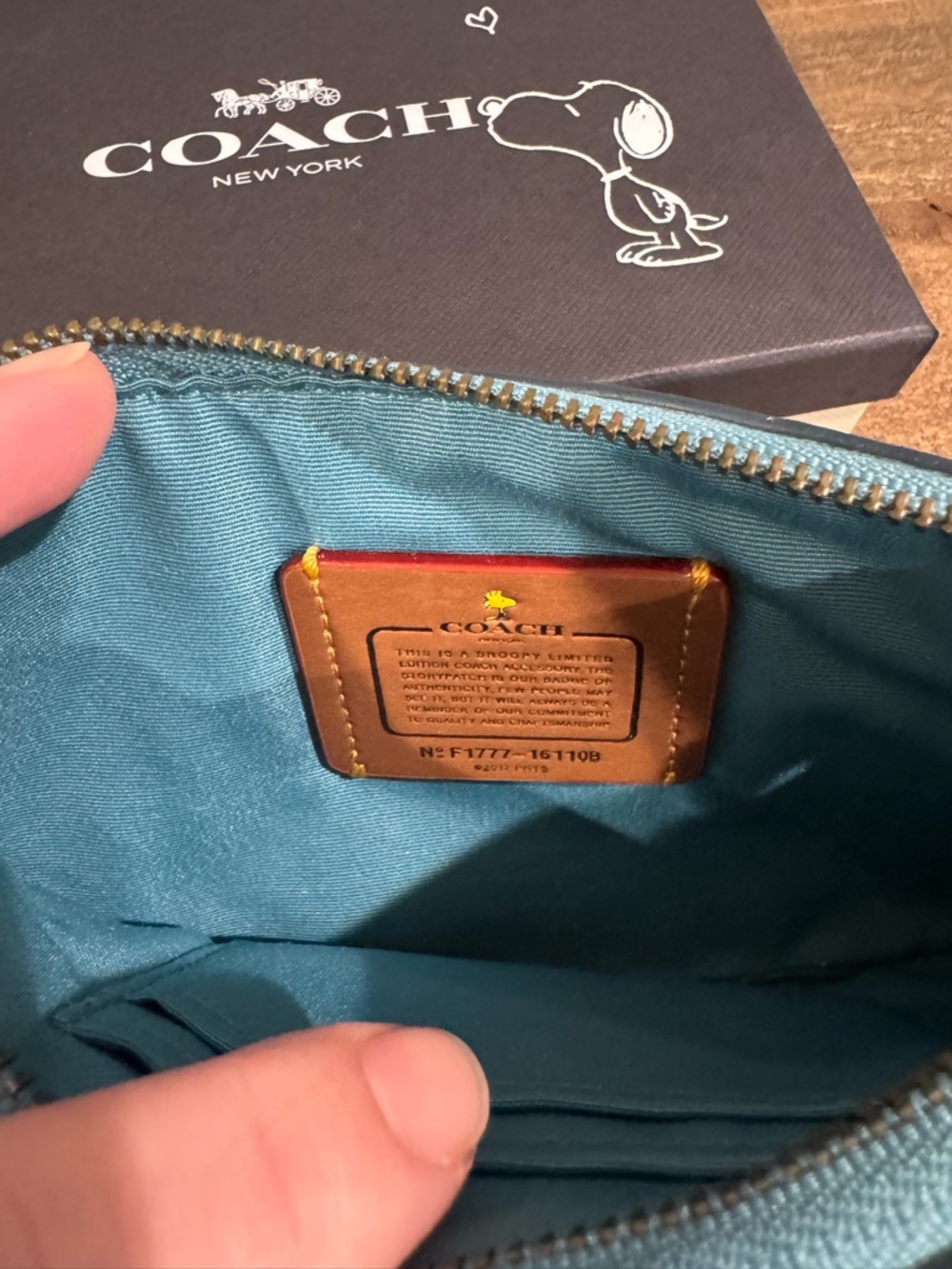 Coach x Peanuts Teal Leather Wristlet with Woodstock - Picture 2 of 3